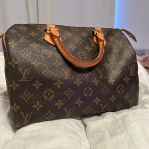 Pre-loved Louis Vuitton monogram Speedy 30